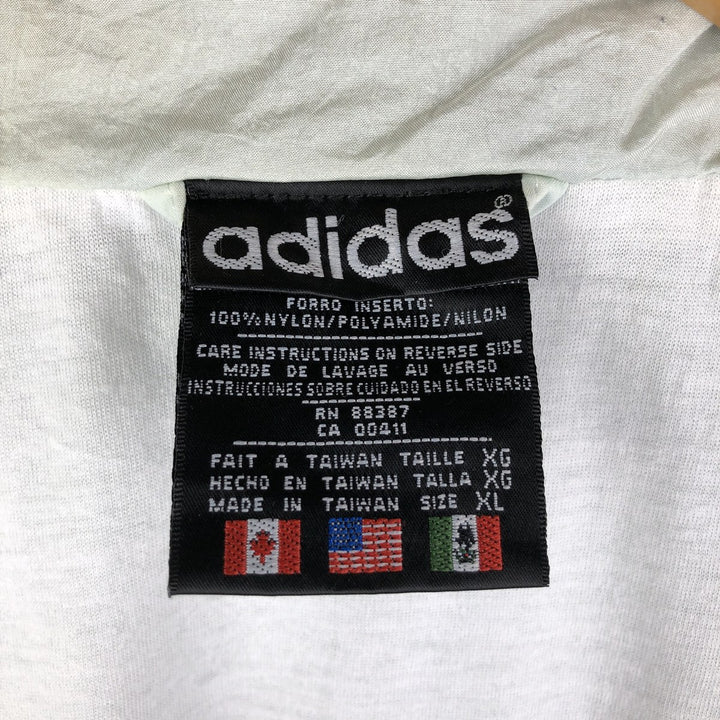 Vintage 80s-90'S Adidas nylon jacket, men's XL size Nylon Blue type light blue Vintage Second Hand