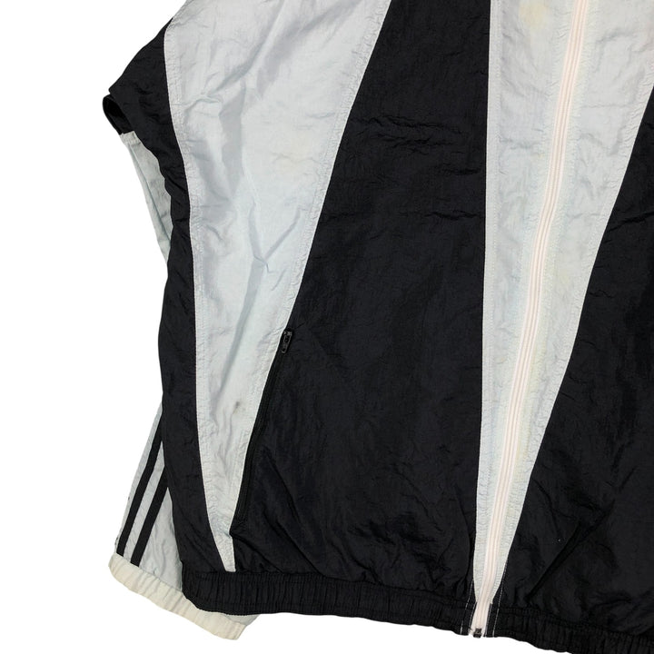 Vintage 80s-90'S Adidas nylon jacket, men's XL size Nylon Blue type light blue Vintage Second Hand