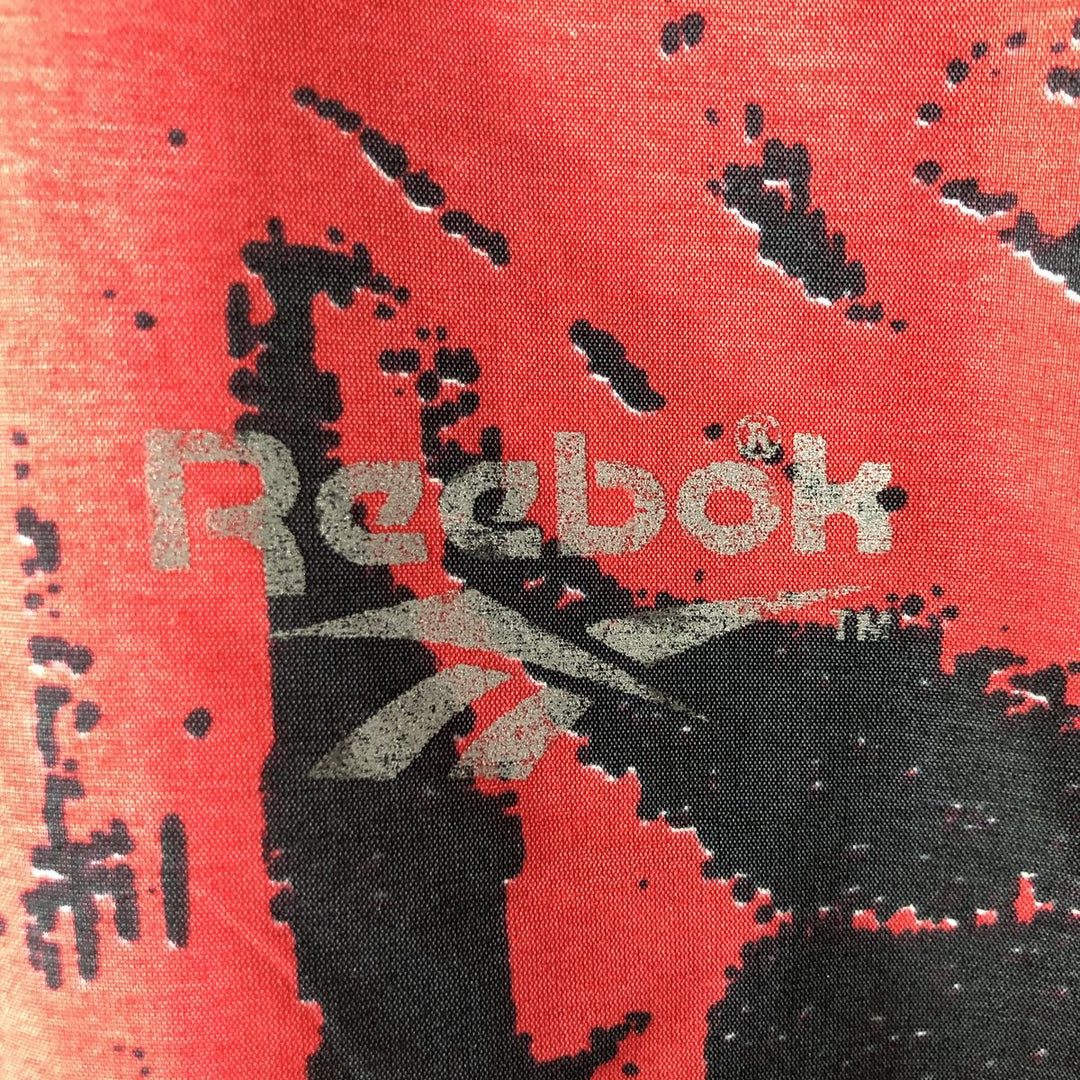 90'S Reebok all-over geometric print half-zip windbreaker, men's size L, vintage polyester red type Vintage Second Hand
