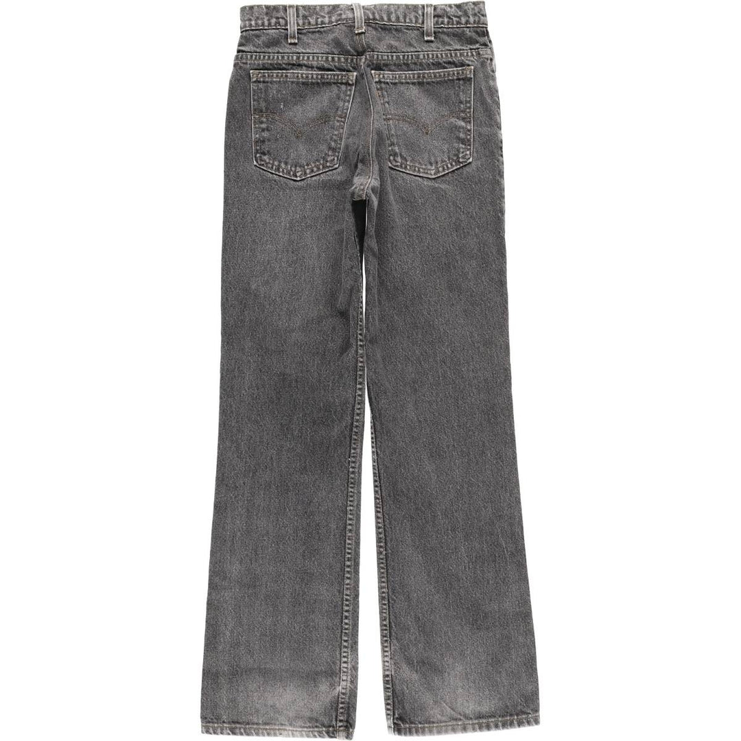 Vintage 90'S Levi's black denim flared denim pants, made in the USA, women's size L (w29). unclear black type Vintage Second Hand