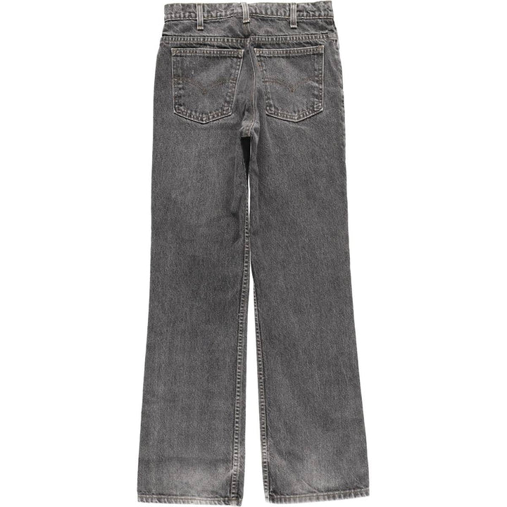 Vintage 90'S Levi's black denim flared denim pants, made in the USA, women's size L (w29). unclear black type Vintage Second Hand