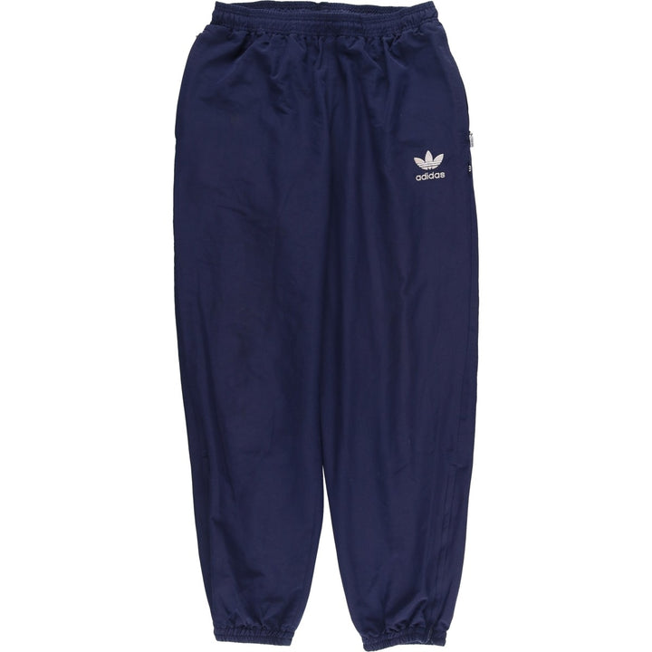 Vintage 1980'S Adidas warm-up pants, nylon, crinkly pants, men's size M. polyester navy blue type Vintage Second Hand
