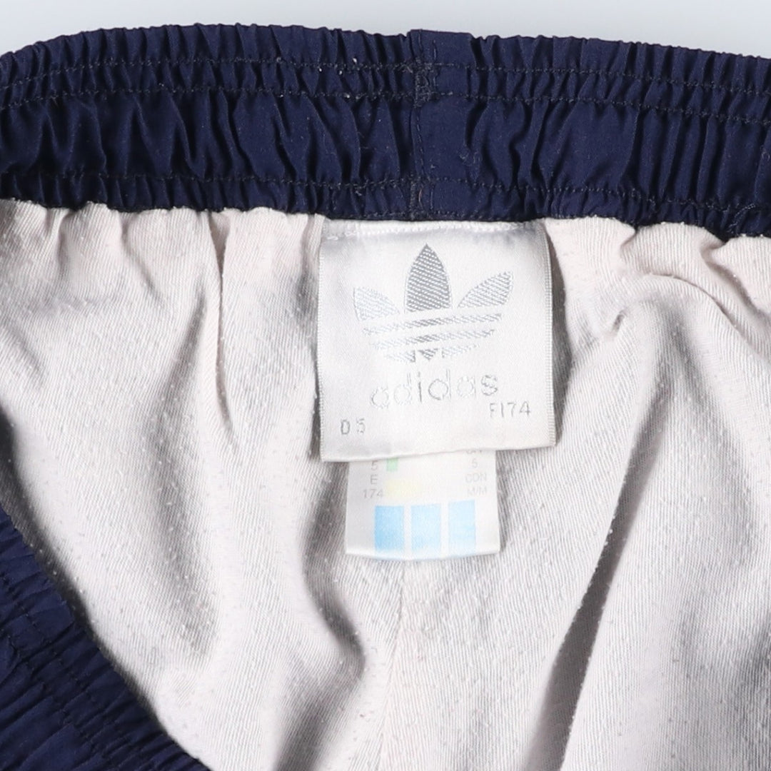 Vintage 1980'S Adidas warm-up pants, nylon, crinkly pants, men's size M. polyester navy blue type Vintage Second Hand