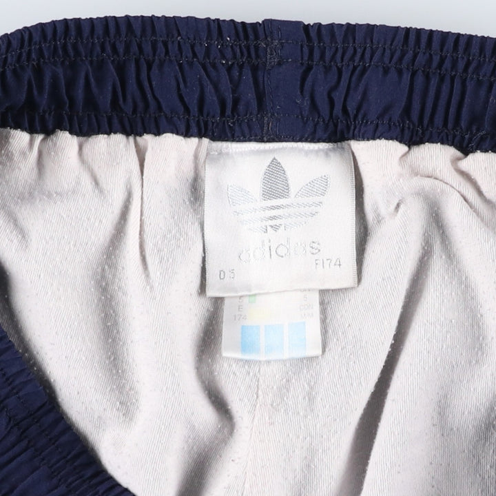 Vintage 1980'S Adidas warm-up pants, nylon, crinkly pants, men's size M. polyester navy blue type Vintage Second Hand