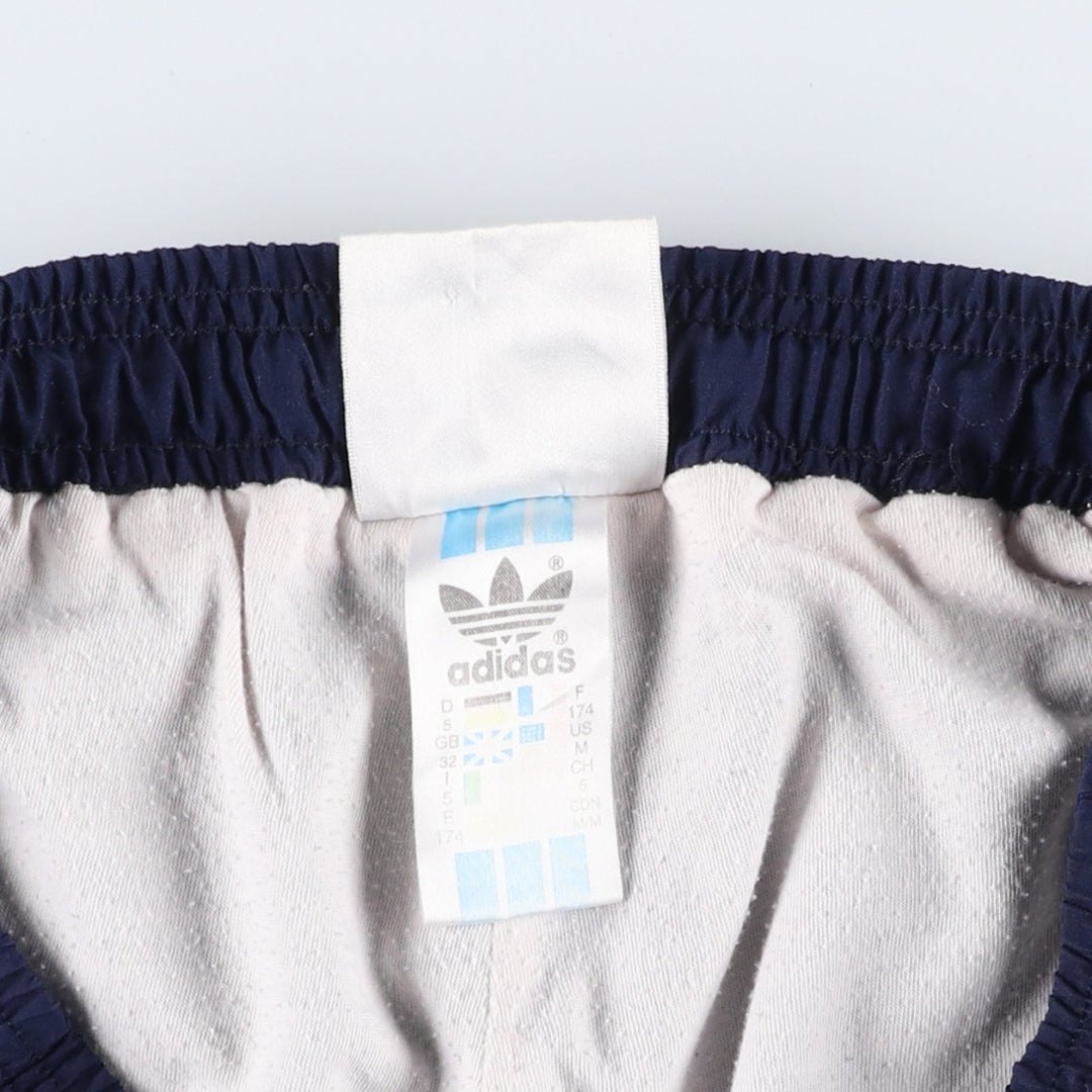 Vintage 1980'S Adidas warm-up pants, nylon, crinkly pants, men's size M. polyester navy blue type Vintage Second Hand