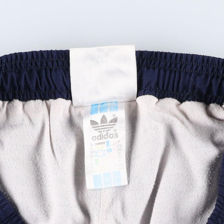 Vintage 1980'S Adidas warm-up pants, nylon, crinkly pants, men's size M. polyester navy blue type Vintage Second Hand