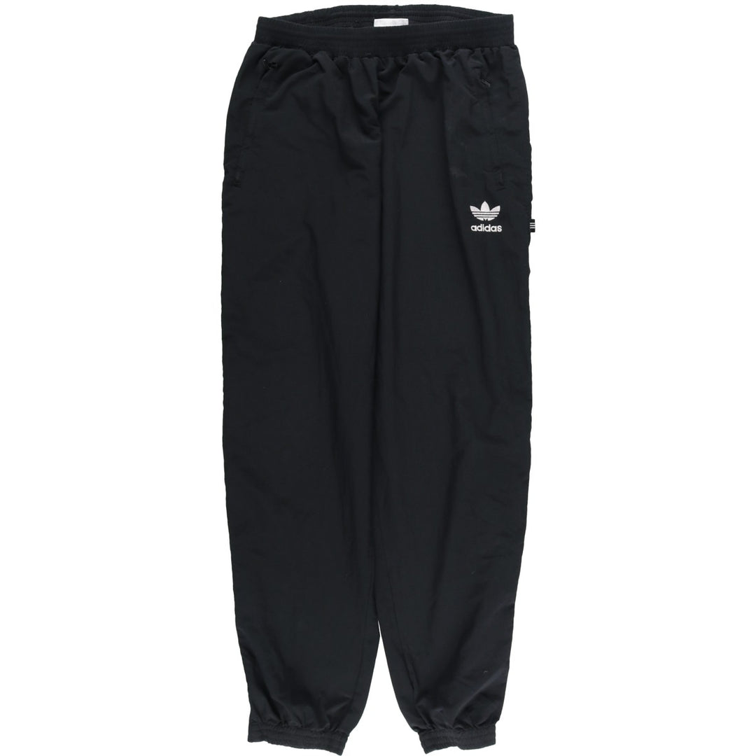 Vintage 1980'S Adidas warm-up pants, nylon, crinkly pants, men's size M. polyester black type Vintage Second Hand