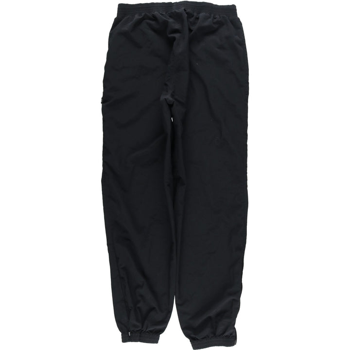 Vintage 1980'S Adidas warm-up pants, nylon, crinkly pants, men's size M. polyester black type Vintage Second Hand