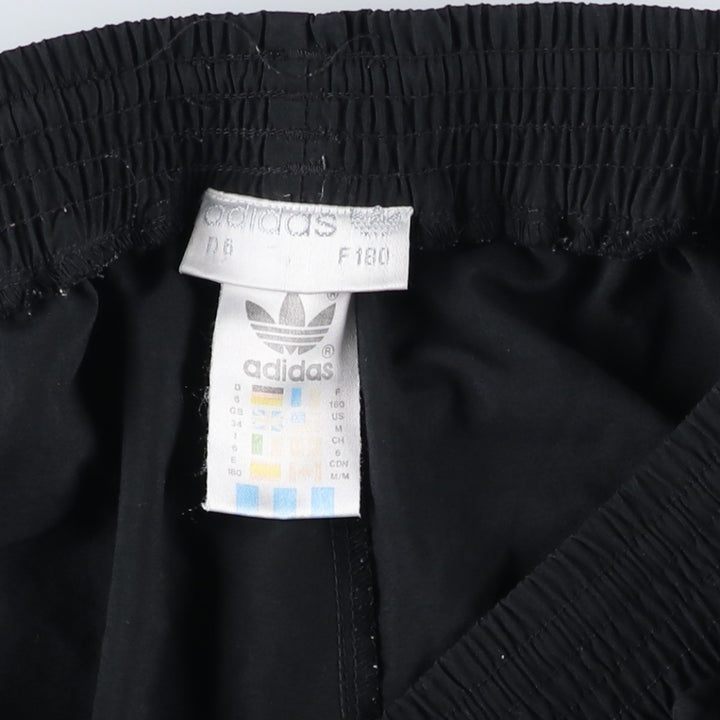 Vintage 1980'S Adidas warm-up pants, nylon, crinkly pants, men's size M. polyester black type Vintage Second Hand