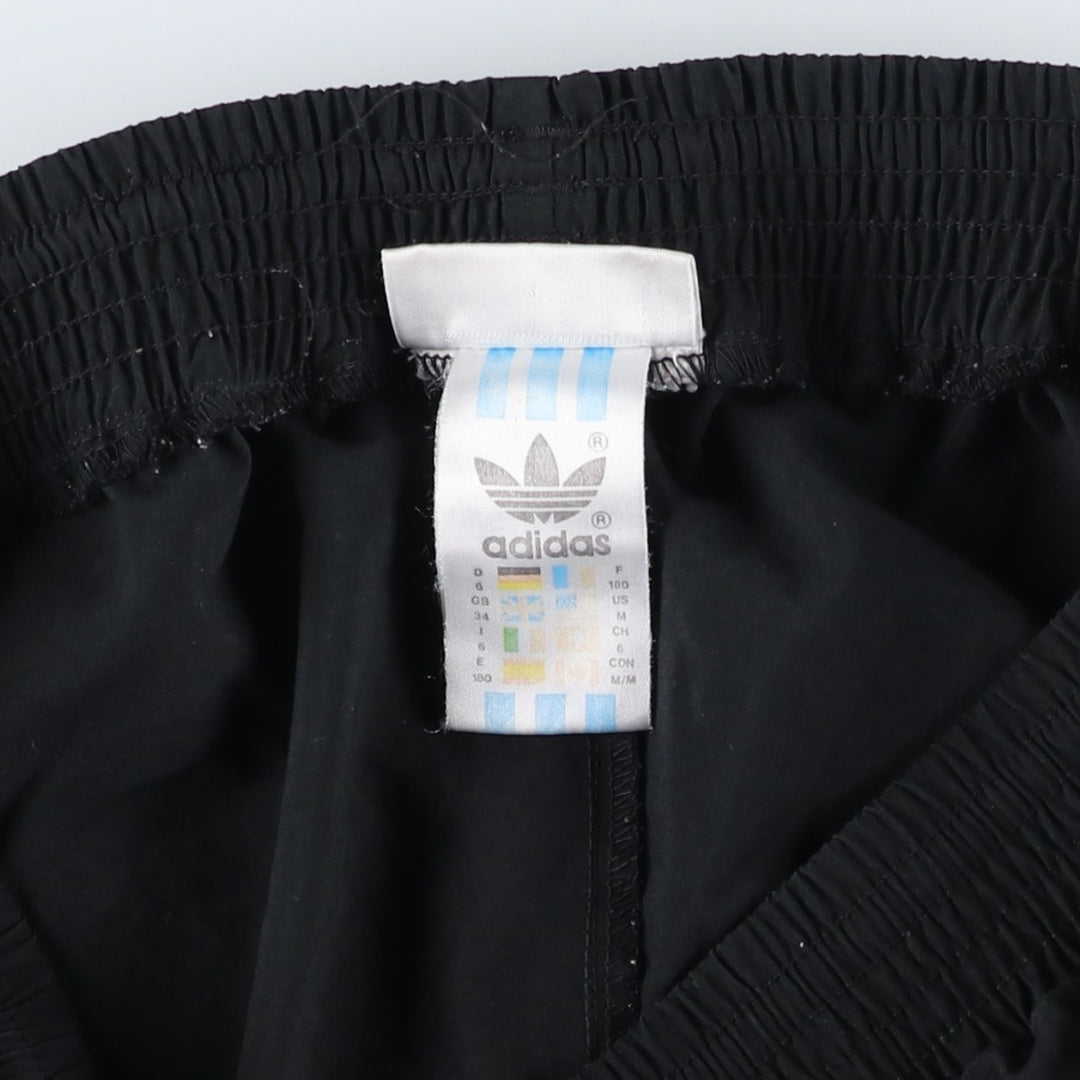 Vintage 1980'S Adidas warm-up pants, nylon, crinkly pants, men's size M. polyester black type Vintage Second Hand