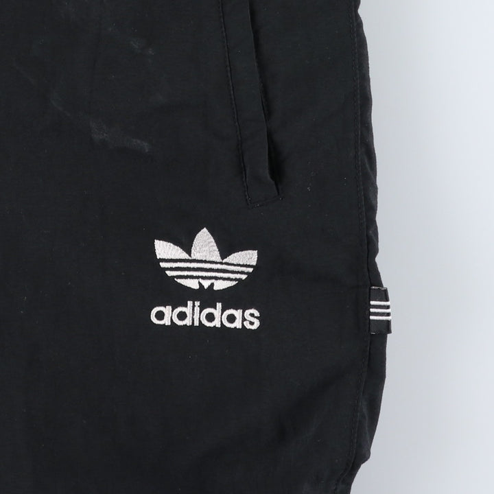 Vintage 1980'S Adidas warm-up pants, nylon, crinkly pants, men's size M. polyester black type Vintage Second Hand