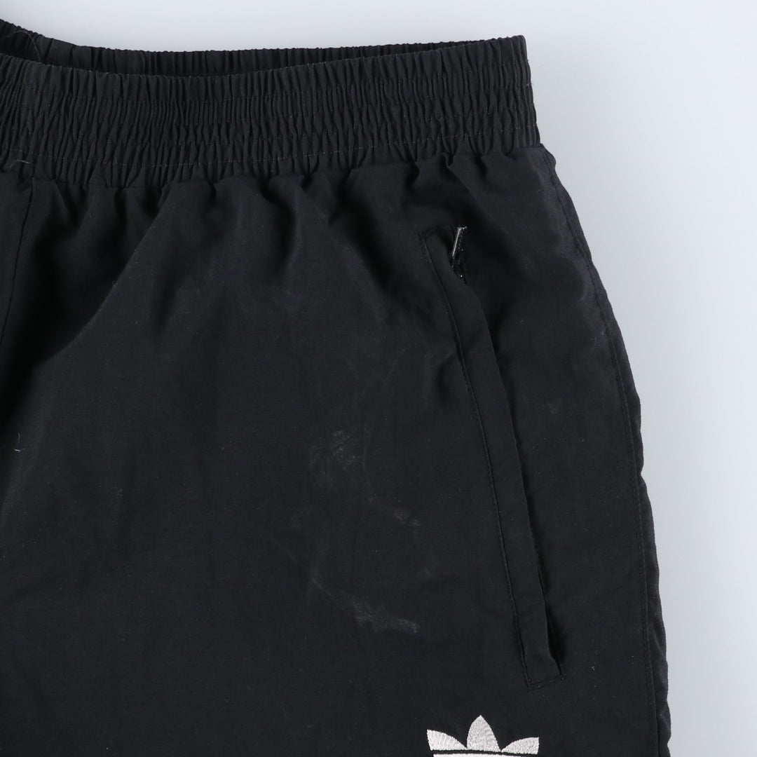 Vintage 1980'S Adidas warm-up pants, nylon, crinkly pants, men's size M. polyester black type Vintage Second Hand