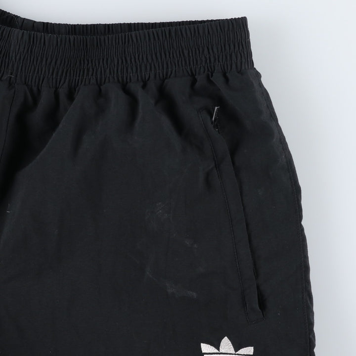 Vintage 1980'S Adidas warm-up pants, nylon, crinkly pants, men's size M. polyester black type Vintage Second Hand
