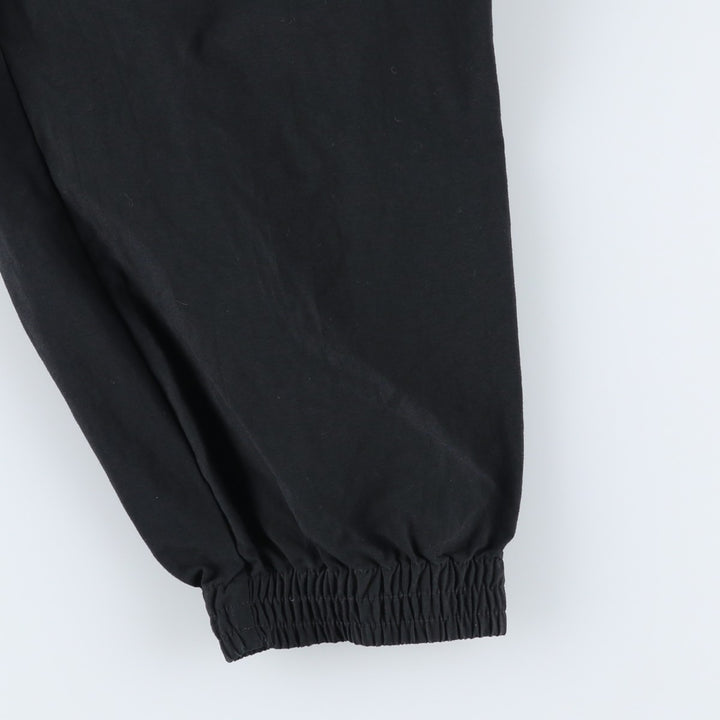 Vintage 1980'S Adidas warm-up pants, nylon, crinkly pants, men's size M. polyester black type Vintage Second Hand