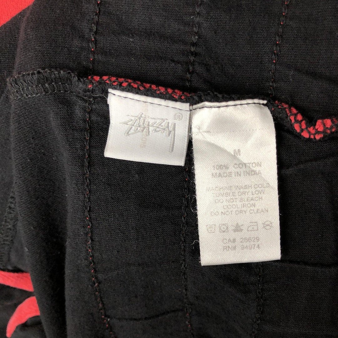 Stussy V-neck logo print T-shirt, men's size M cotton black type Vintage Second Hand