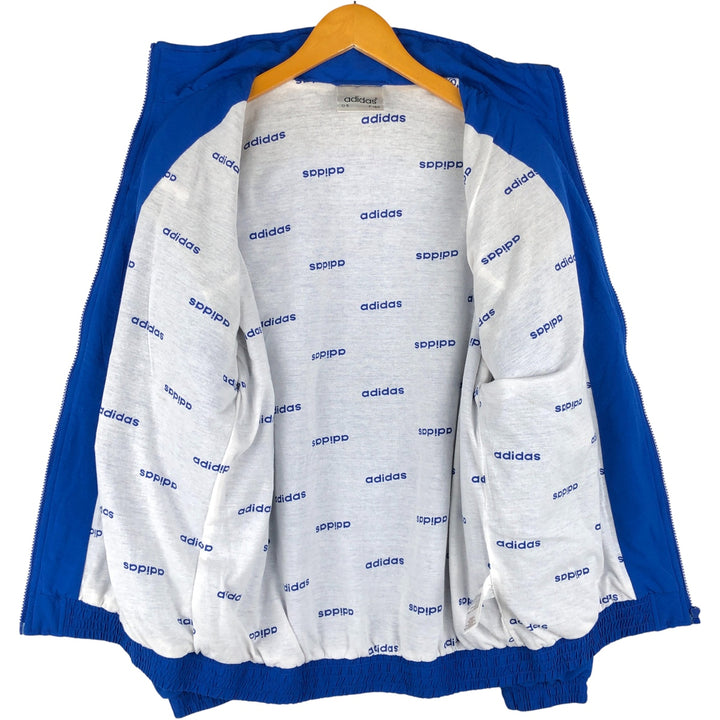 Vintage 90'S Adidas windbreaker, men's size M, full-zip, long sleeves polyester blue type Vintage Second Hand