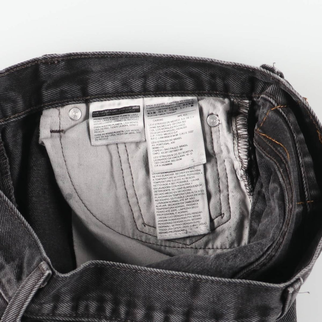 Vintage Levi's 505 black denim tapered denim pants, men's size W32. cotton black type Vintage Second Hand