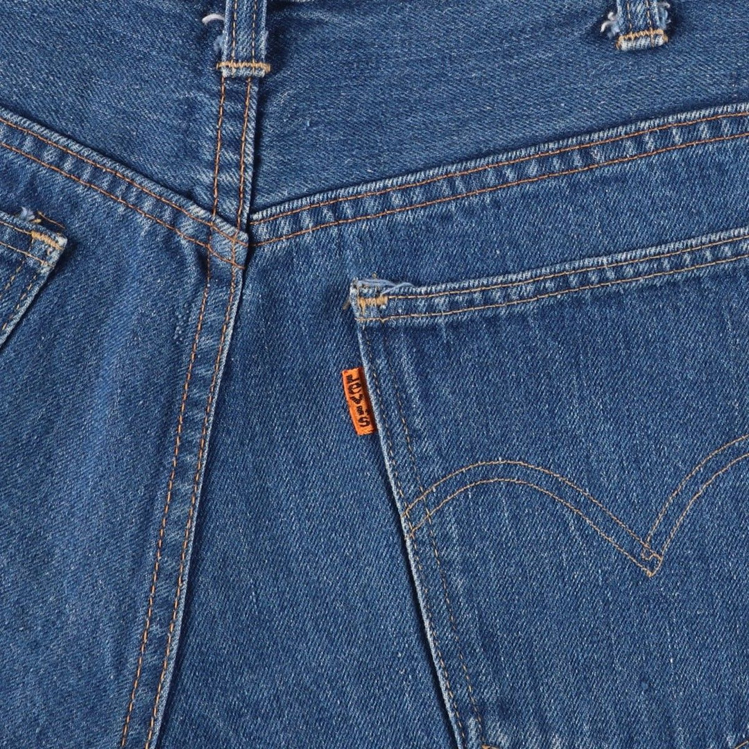 Vintage Levi's cut-off denim shorts with orange tabs, women's size XL (w31). unclear blue type Vintage Second Hand