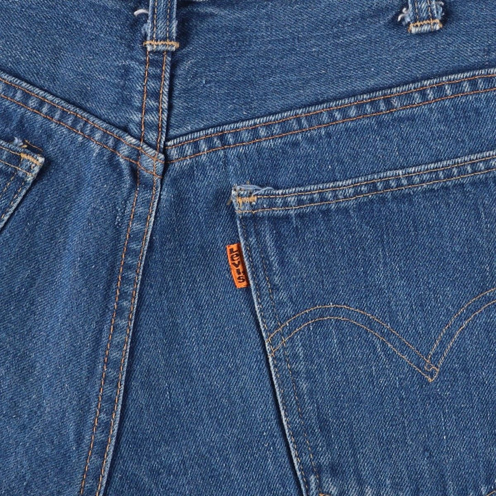 Vintage Levi's cut-off denim shorts with orange tabs, women's size XL (w31). unclear blue type Vintage Second Hand