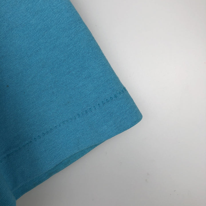 Vintage 90'S Fruit of the Loom Fleet Farm advertising T-shirt, Made in USA, Men's Size Large cotton Blue type light blue Vintage Second Hand