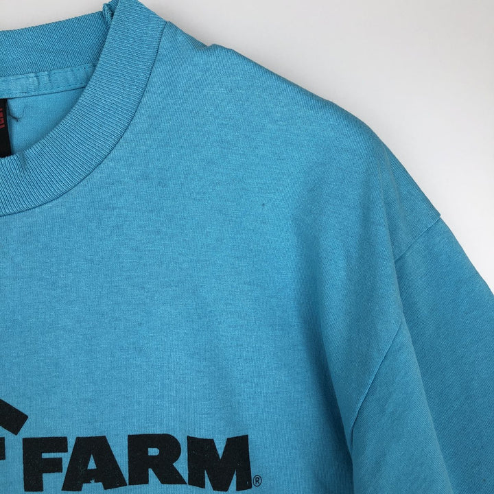Vintage 90'S Fruit of the Loom Fleet Farm advertising T-shirt, Made in USA, Men's Size Large cotton Blue type light blue Vintage Second Hand
