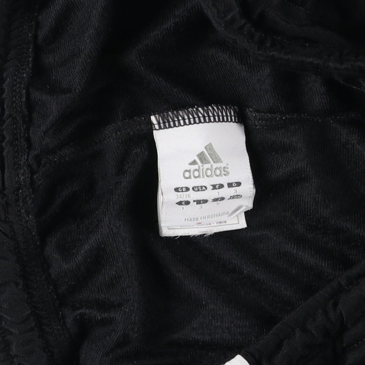 Adidas track pants for women, size XL (equivalent to W33). polyester black type Vintage Second Hand