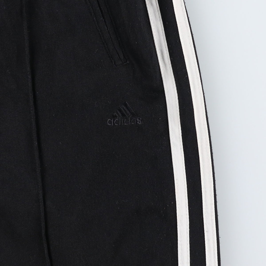 Adidas track pants for women, size XL (equivalent to W33). polyester black type Vintage Second Hand