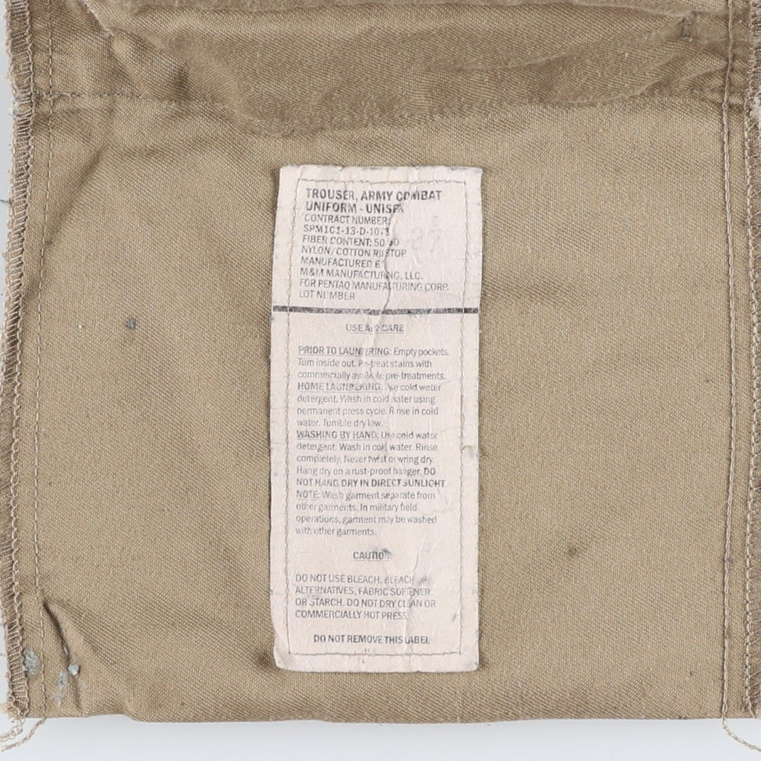 Genuine US military surplus Multicam camouflage pattern ripstop military cargo pants/combat pants, made in the USA, men's size W31 equivalent. Nylon Khaki type Vintage Second Hand