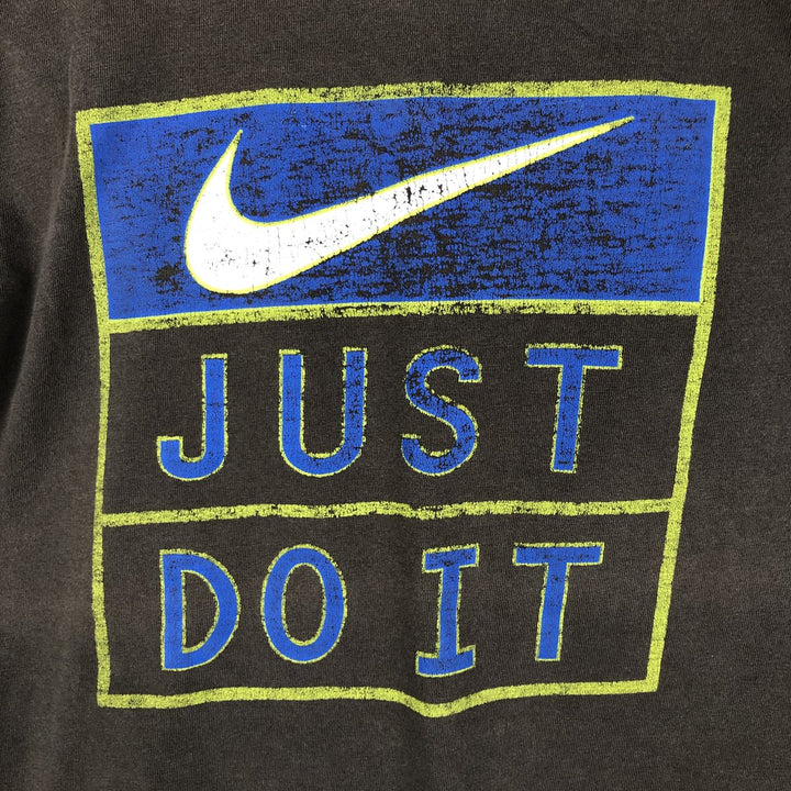 90'S Nike T-shirt with back logo print, men's size M equivalent, vintage. cotton brown type Vintage Second Hand