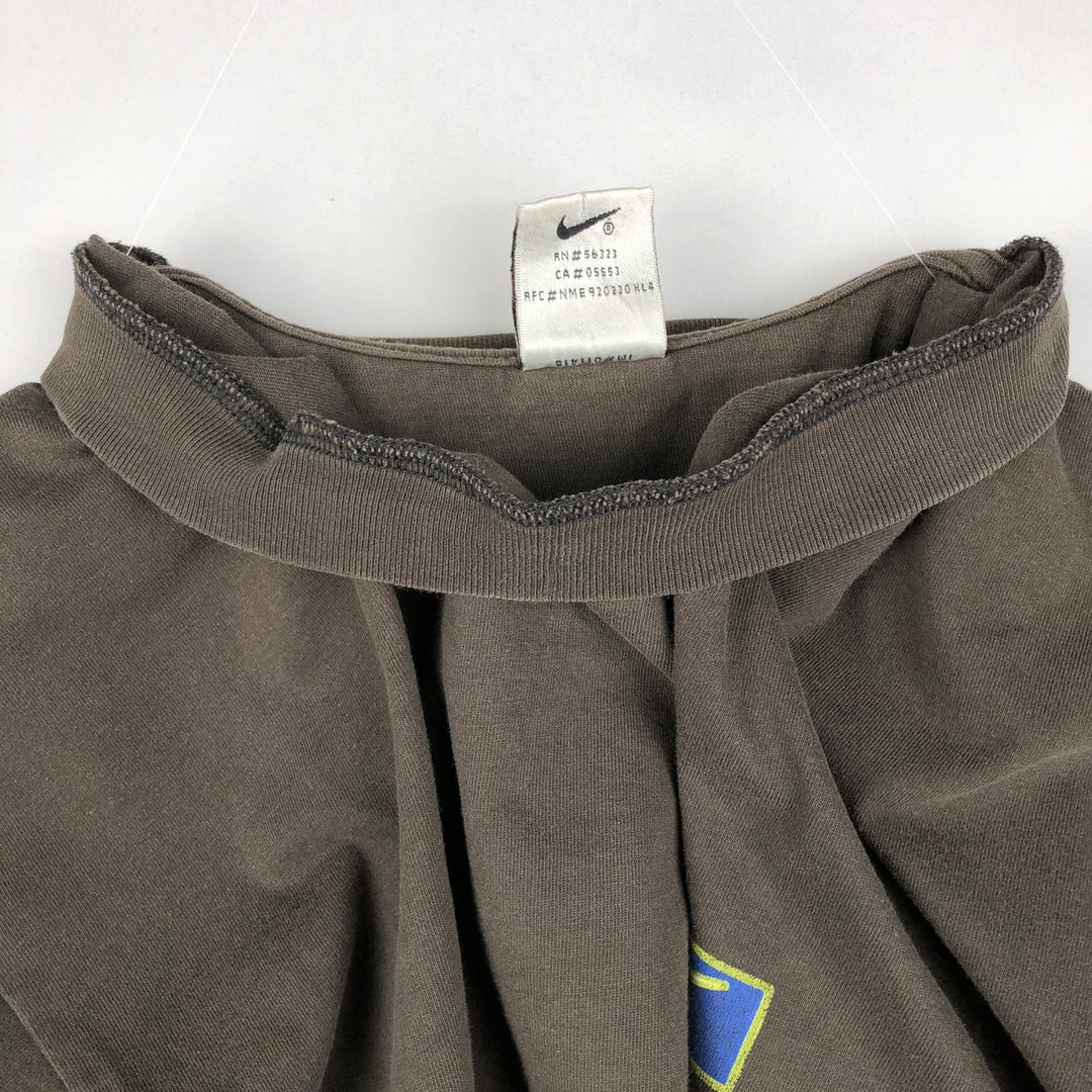90'S Nike T-shirt with back logo print, men's size M equivalent, vintage. cotton brown type Vintage Second Hand
