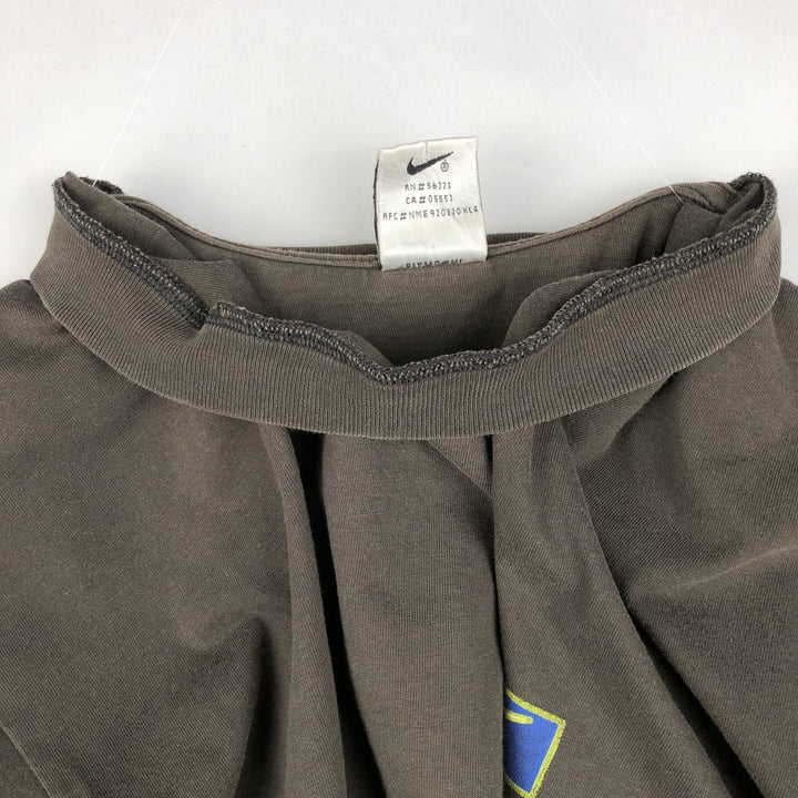 90'S Nike T-shirt with back logo print, men's size M equivalent, vintage. cotton brown type Vintage Second Hand