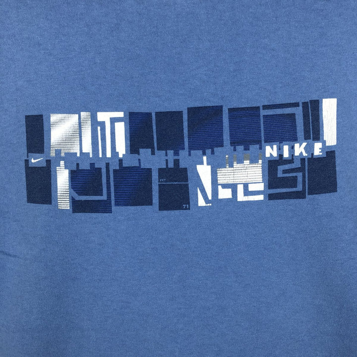 Nike logo print T-shirt, made in USA, men's size XL. cotton blue type Vintage Second Hand