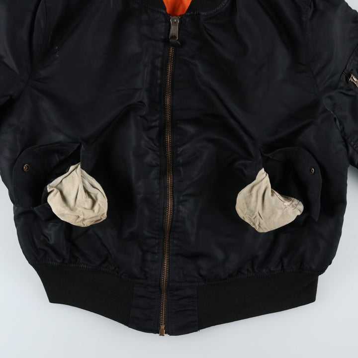 Civilian-made Alpha Industries MA-1 type padded military flight jacket, made in the USA, XX-LARGE (equivalent to men's XXL). Nylon black type Vintage Second Hand