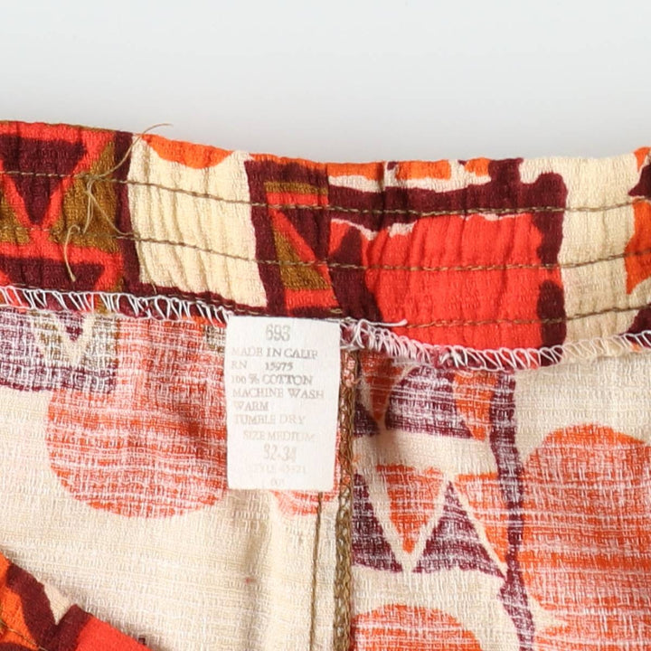 All-over print swim shorts, made in the USA, women's size M equivalent. cotton red type Vintage Second Hand