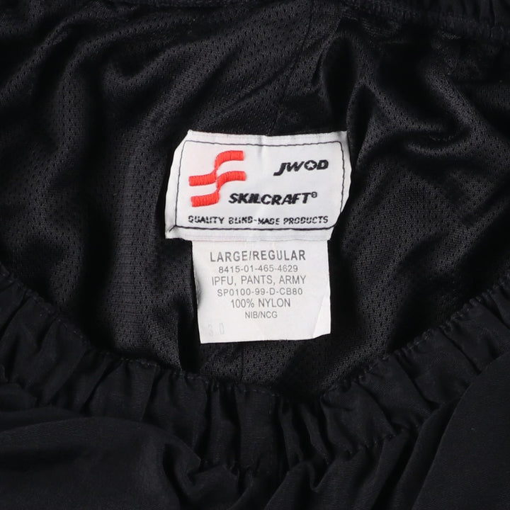 Authentic US military issue, 1990'S SKILCRAFT IPFU PANTS, ARMY training pants, nylon pants, windbreaker style, made in USA, men's size L equivalent. Nylon black type Vintage Second Hand