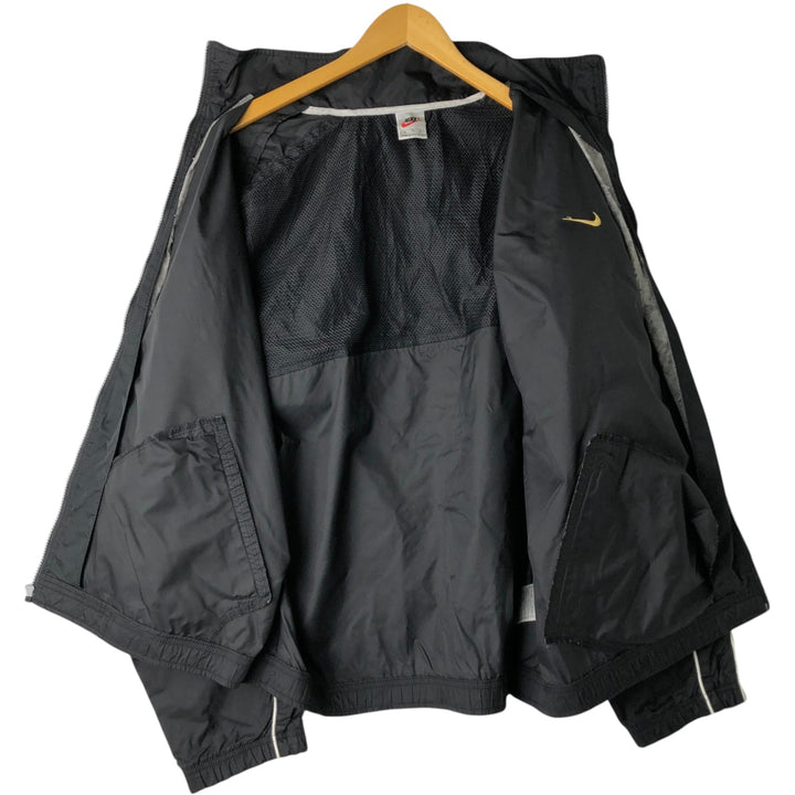 90s-era Nike nylon jacket, men's size XL equivalent, vintage. Nylon black type Vintage Second Hand