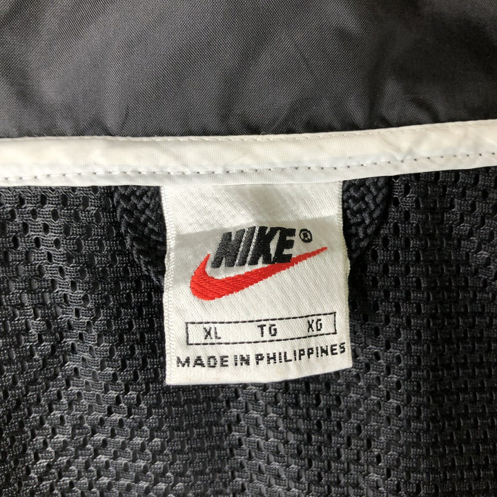 90s-era Nike nylon jacket, men's size XL equivalent, vintage. Nylon black type Vintage Second Hand