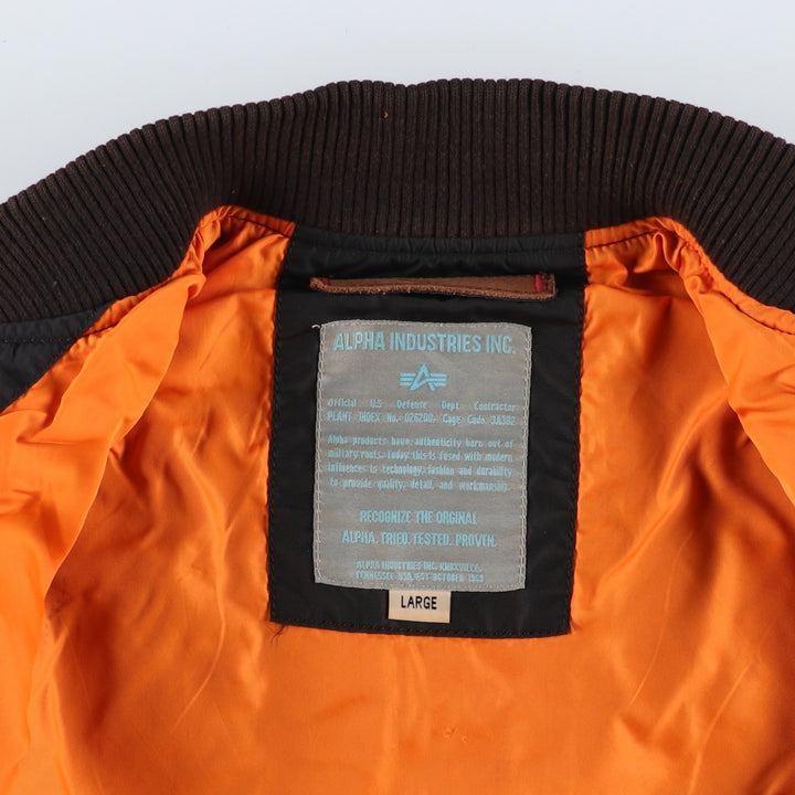 Civilian-made Alpha Industries military flight jacket, women's size L equivalent. Nylon black type Vintage Second Hand
