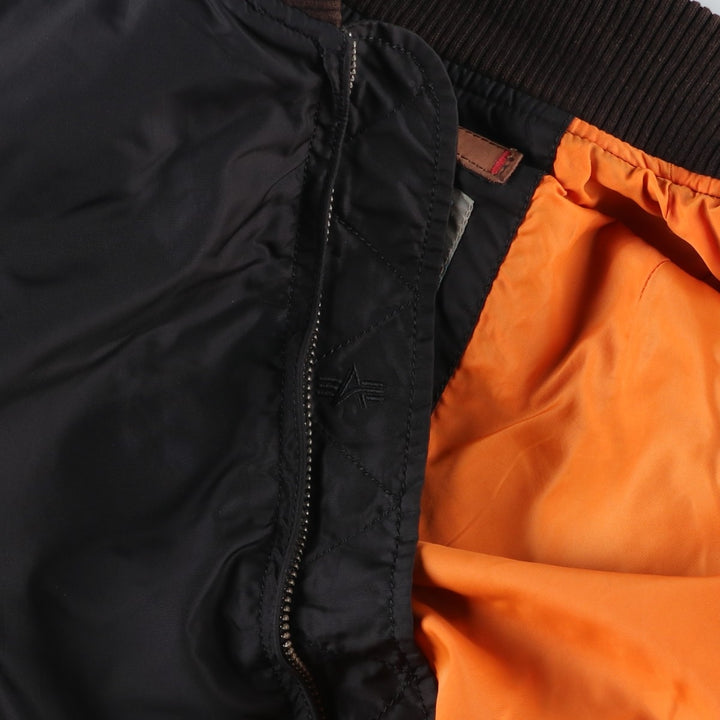Civilian-made Alpha Industries military flight jacket, women's size L equivalent. Nylon black type Vintage Second Hand