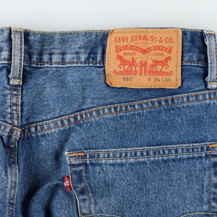 Levi's 550 tapered denim pants for men, size W34 cotton blue type Vintage Second Hand