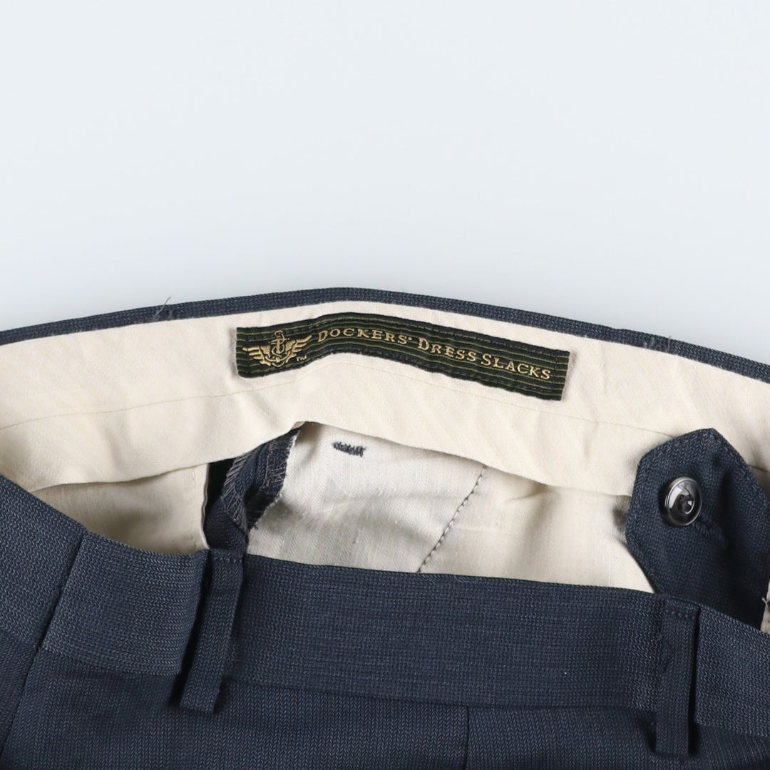 Dockers three-pleat slacks pants for men, equivalent to size W34. unclear black type Vintage Second Hand