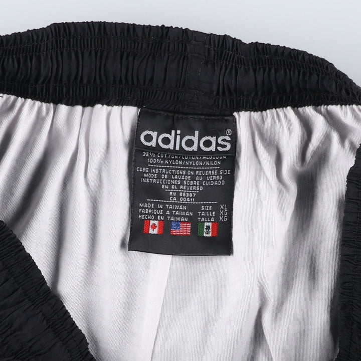 Vintage 90'S Adidas nylon pants, crinkle pants, men's size XL Nylon black type Vintage Second Hand