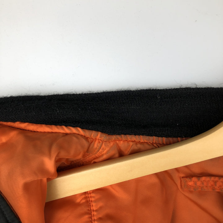 Civilian-made Alpha Industries MA-1 type padded military flight jacket, made in the USA, men's size M equivalent, vintage. Nylon black type Vintage Second Hand