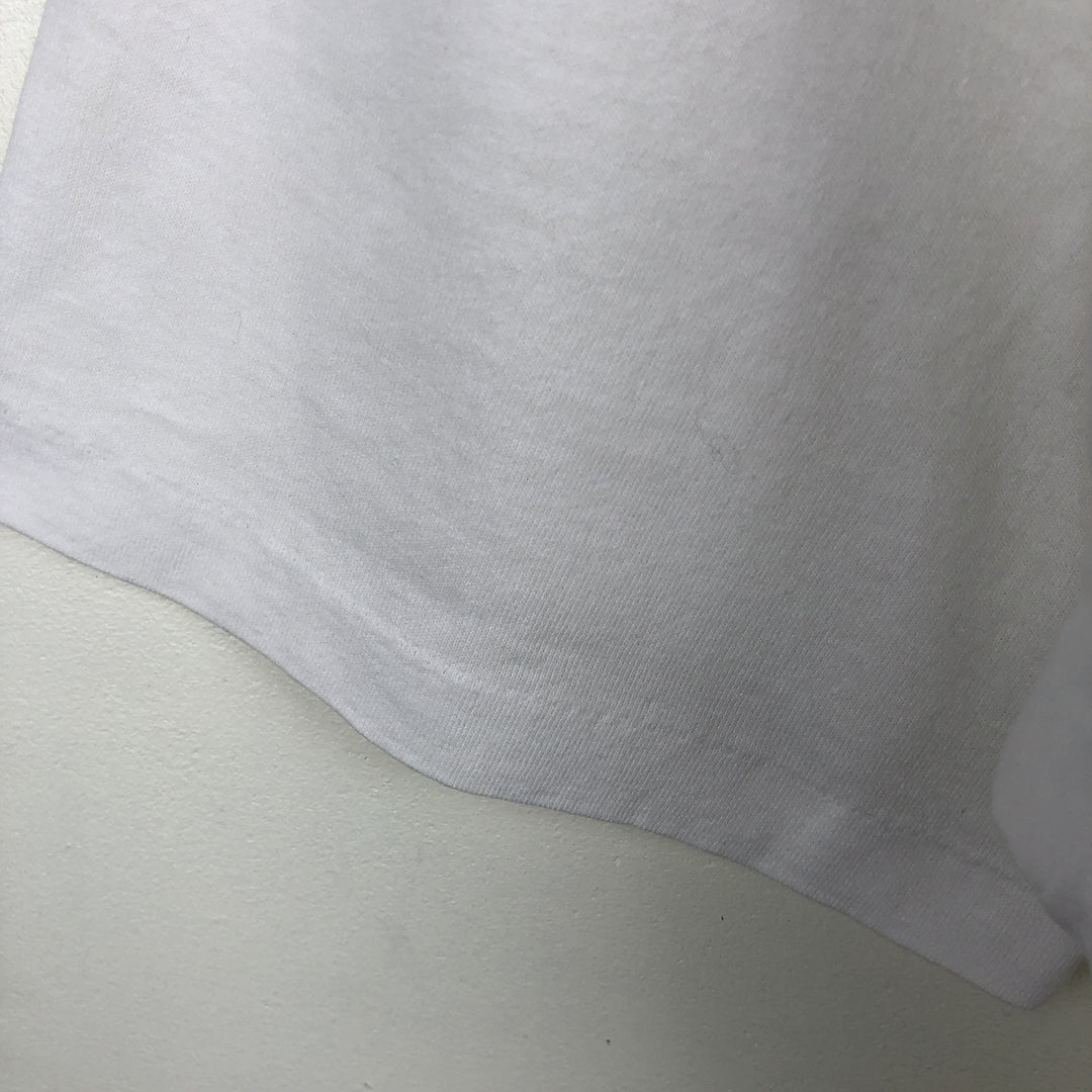 Vintage 90'S Hanes printed T-shirt, made in the USA, size L for men cotton white type Vintage Second Hand