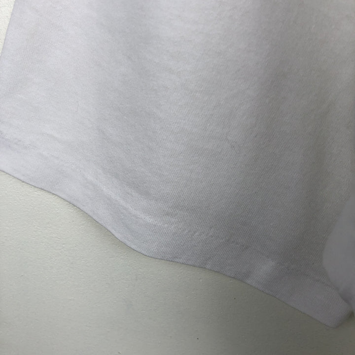 Vintage 90'S Hanes printed T-shirt, made in the USA, size L for men cotton white type Vintage Second Hand