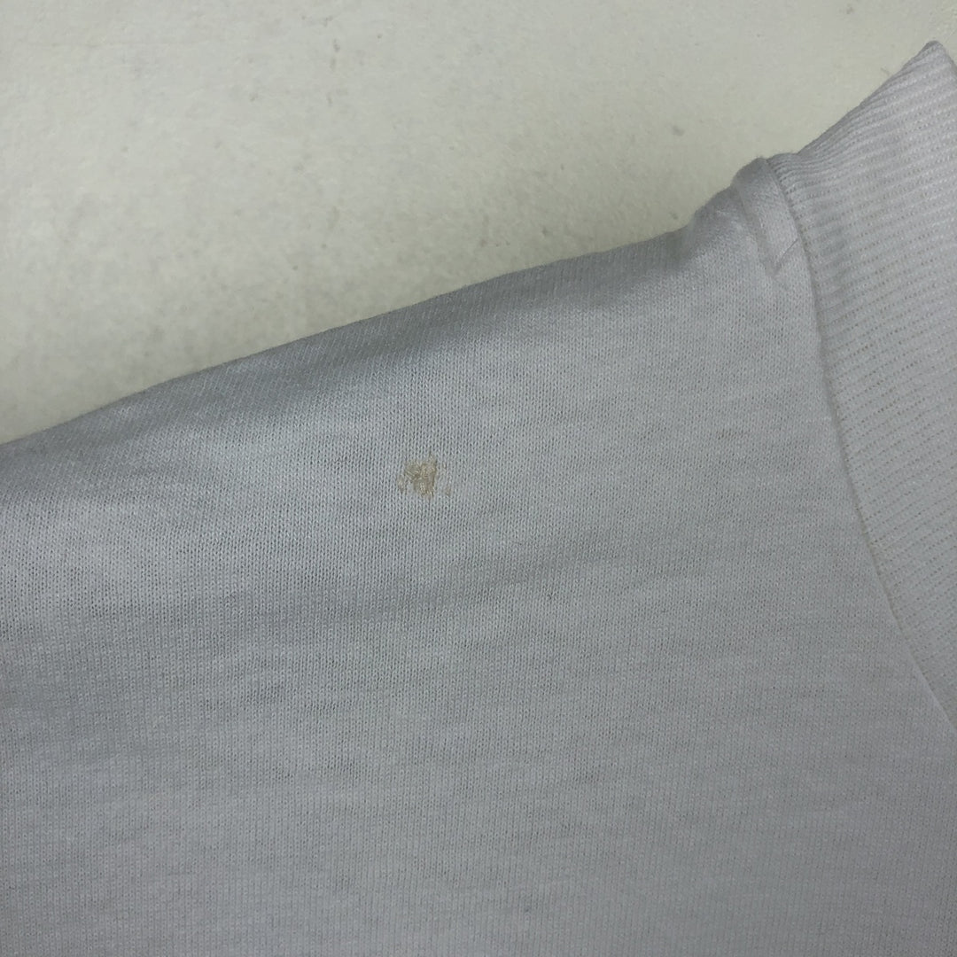 Vintage 90'S Hanes printed T-shirt, made in the USA, size L for men cotton white type Vintage Second Hand