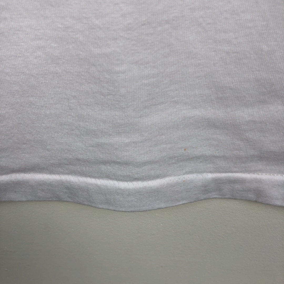 Vintage 90'S Hanes printed T-shirt, made in the USA, size L for men cotton white type Vintage Second Hand