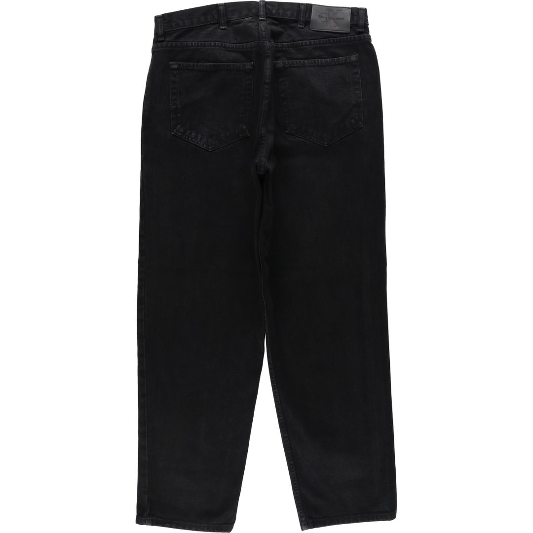 90s-00'S Calvin Klein Jeans, Black Denim Tapered Jeans, Men's W36 (approx.), Vintage cotton black type Vintage Second Hand