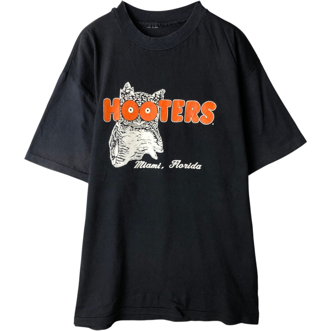 Vintage 1990'S Hooters advertising t-shirt, men's size L (approx.). unclear black type Vintage Second Hand