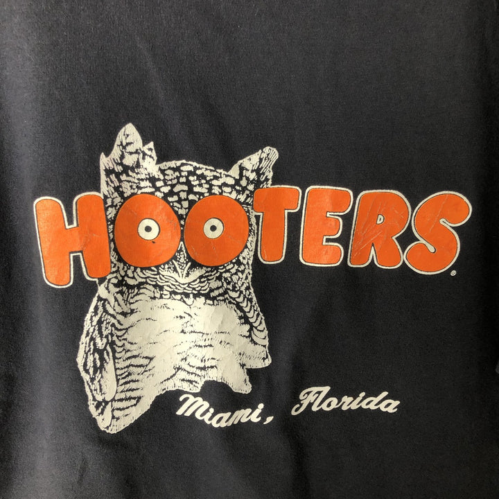 Vintage 1990'S Hooters advertising t-shirt, men's size L (approx.). unclear black type Vintage Second Hand